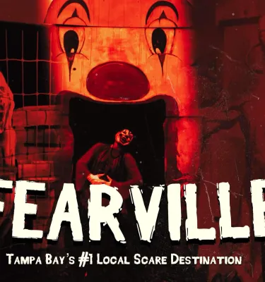 Fearville halloween festival in Largo featuring a man dressed up in a scary mask.
