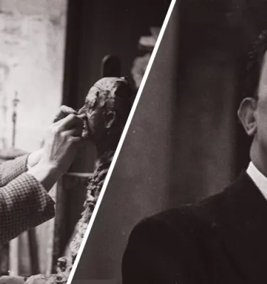 Black and white photo of artists Alberto Giacometti and Salvador Dali.