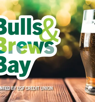 Bulls & Brews by the Bay event flyer poster featuring a glass of beer on a wooden table.