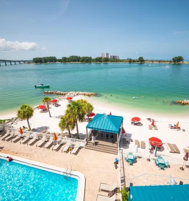the pool and beach at Dolphin Sands hotel on Clearwater Beach