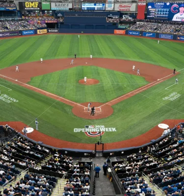 fans in the stands and the green field at Tropicana for a Tampa Bay Rays home game