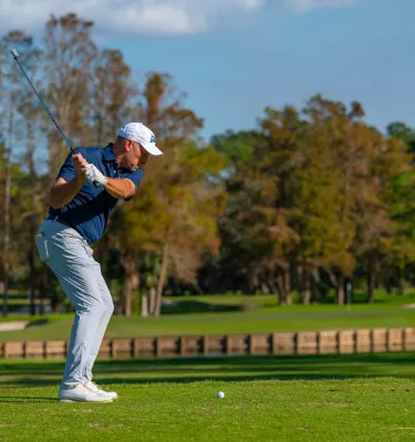 man golfing