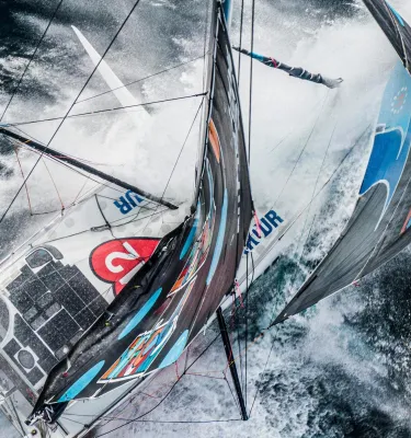 a thrilling overhead view of a sailboat in the Ocean Race, coming to St. Pete-Clearwater in May 2027