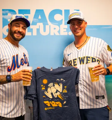 men holding 727 day shirt 