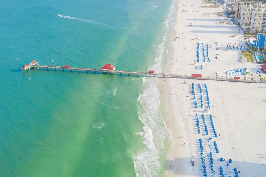 Aerial view of Pier 60 and blue cabanas in Clearwater Beach