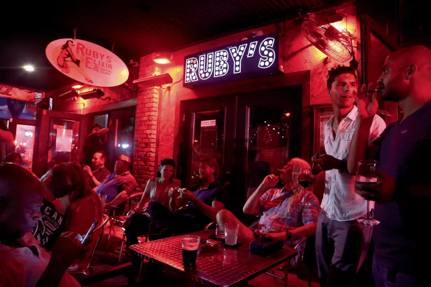 A crowd of patrons outside of Ruby's Elixir Bar in downtown St. Pete