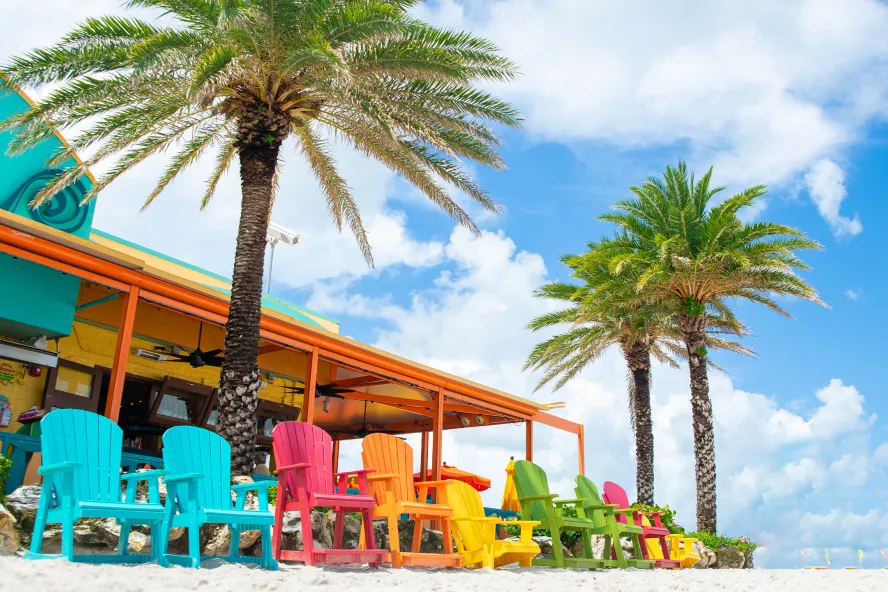 A set of colorful chairs outside of Frenchy's Rockaway Grill in Clearwater Beach
