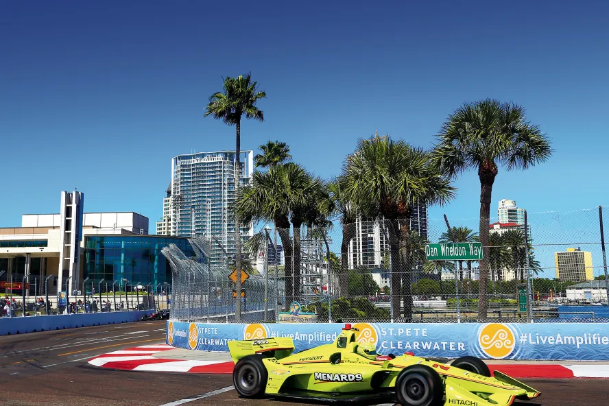 A yellow racing car in the St. Pete Firestone Grand Prix.