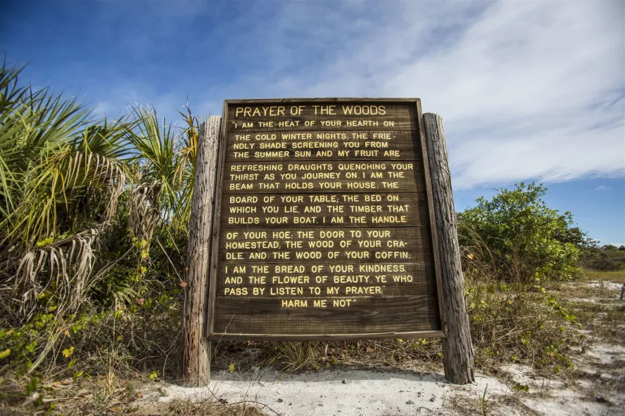 A image of the Prayer of the Woods sign at Weedon Island