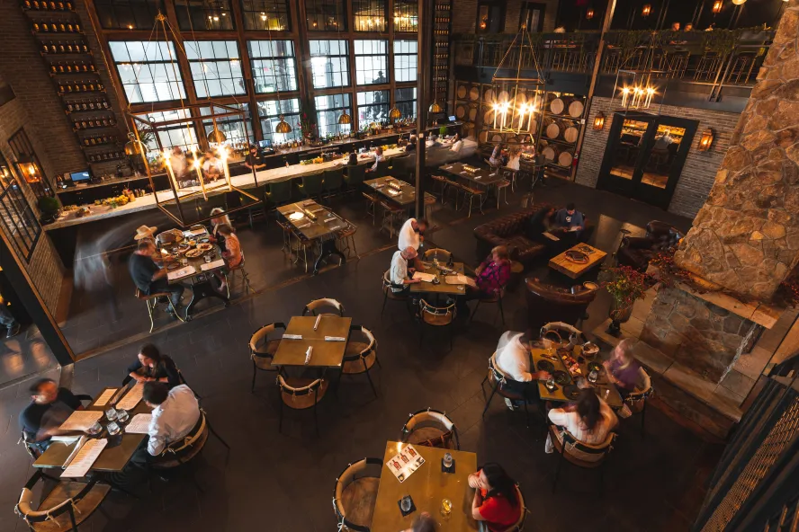 Arial View of a Stillhouse with dining area. Wood accents and brick and rock walls