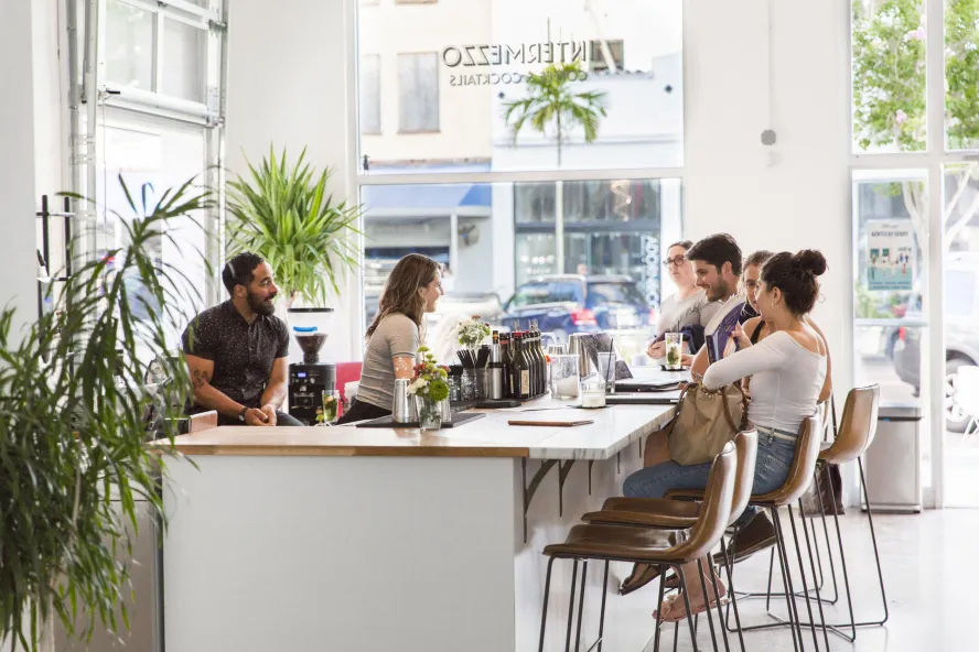 A group of people at the bar of intermezzo in downtown St. Pete