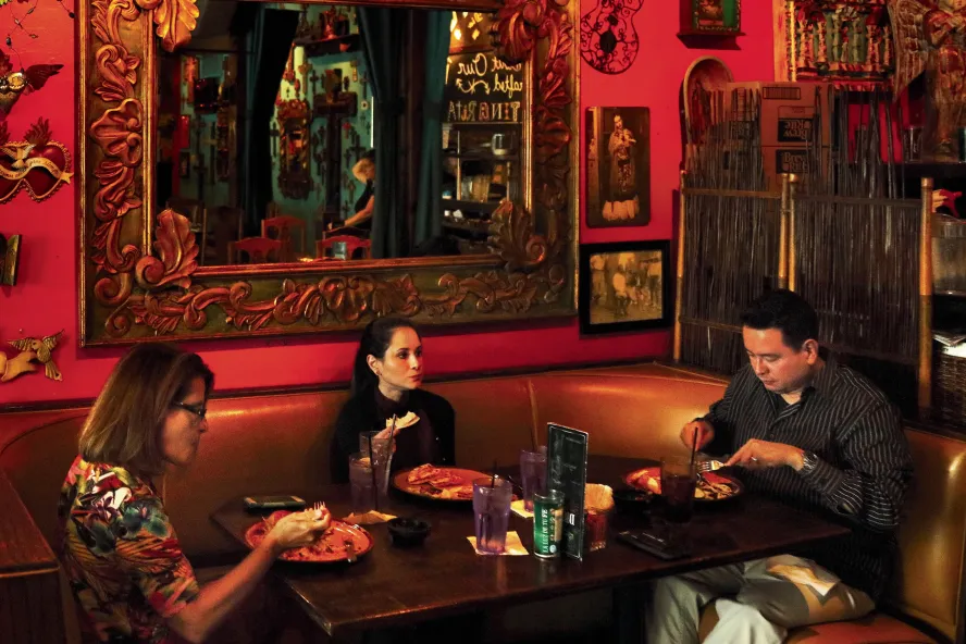 A family dines at Casa Tina Mexican Grill
