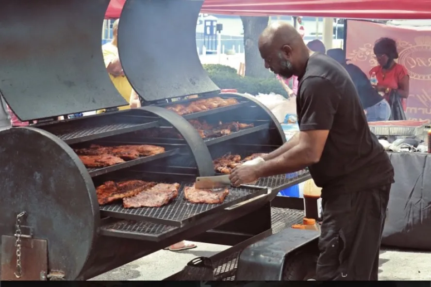 Saturday Morning Shoppe vendor cooking bbq