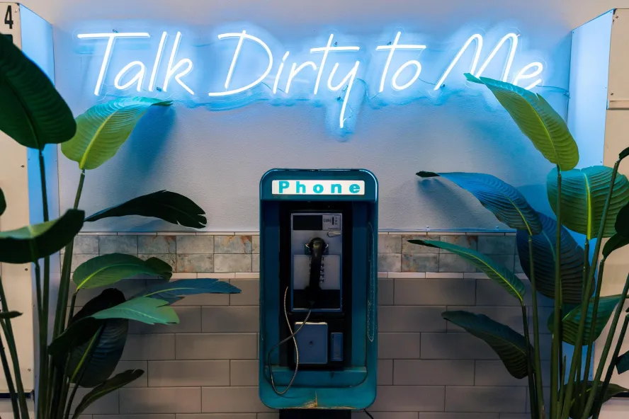 Image of the secret payphone entrance at Dirty Laundry in St. Pete to enter their special speakeasy lounge.