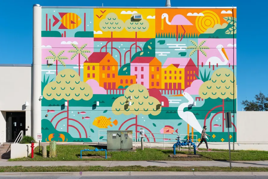 A brightly colored folk art style mural depicting mangroves, bird life and the environment near St. Pete FL), Museum Waterfront District