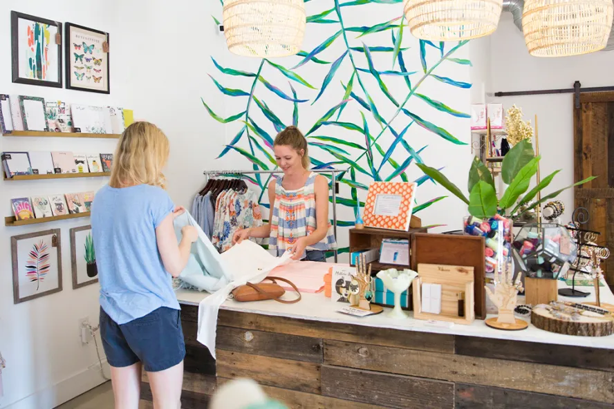 A woman shopping at a boutique