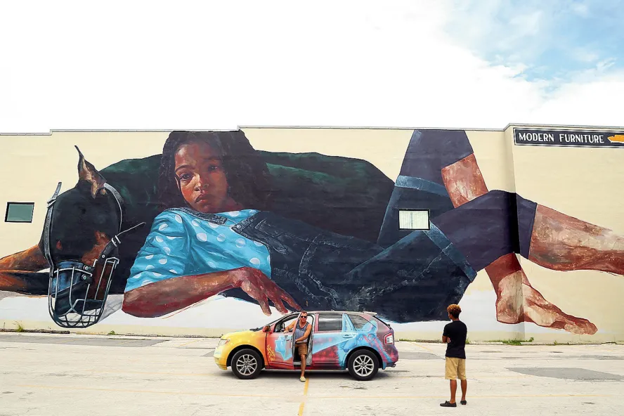 Girl with Doberman mural