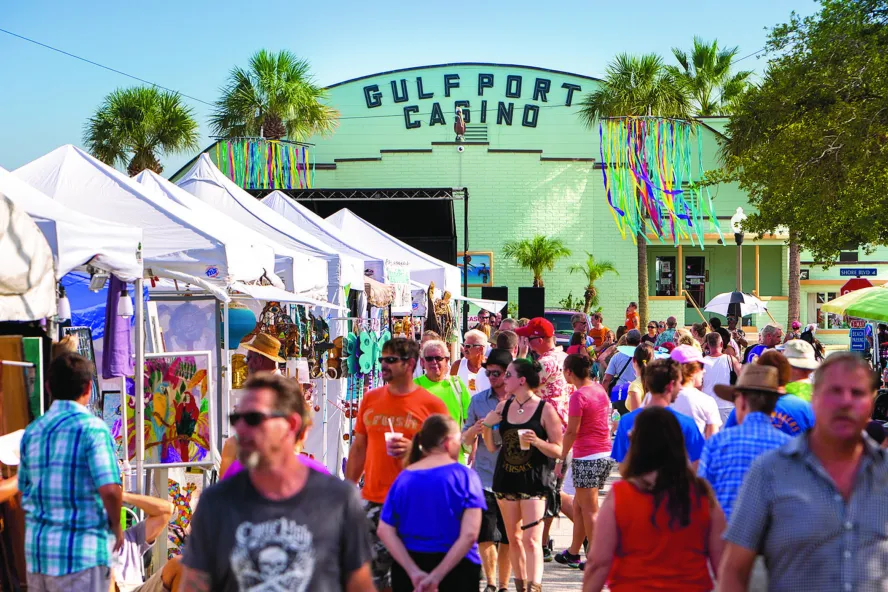 Crowd at GeckoFest with crafts tents and Gulfport Casino.
