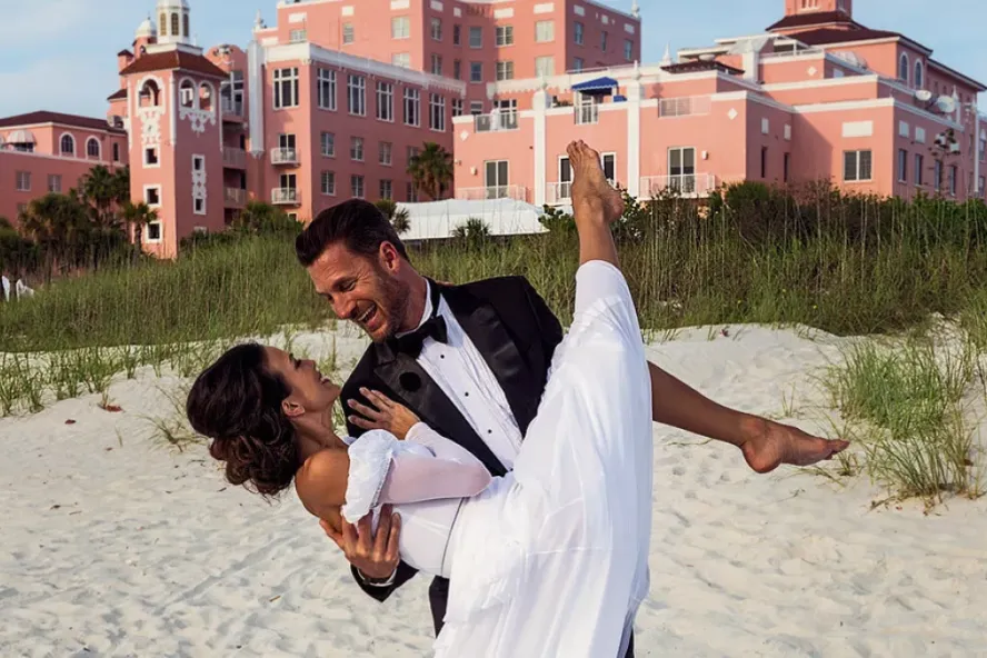 Couple on beach in front of Don Cesar