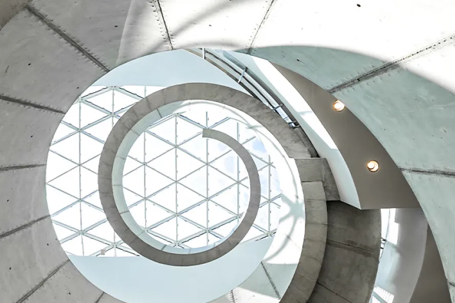 Winding spiral white staircase inside the Dali Museum.