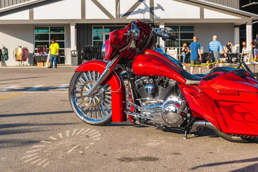 a red motorcycle in front of a building at St. Pete Bikefest