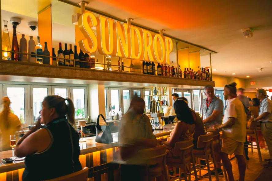 People having drinks at the bar at Sundrop