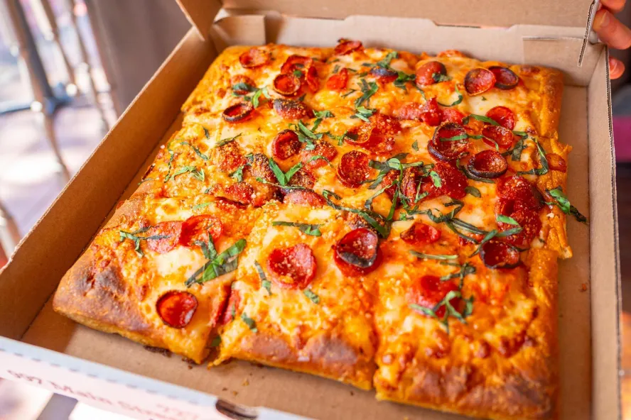 a thick-crust square pepperoni pizza in a box from Nona Slice House in Safety Harbor