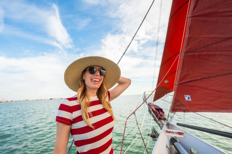 a young woman at the bow of a day cruise with Suncoast Sailing in Treasure Island