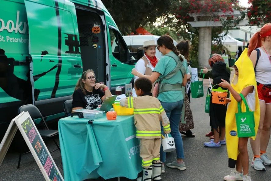 Kids trick-or-treating on the St. Pete USF Campus.