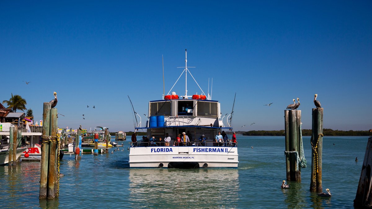 Florida Fisherman boat leaving John's Pass Marina in Madeira Beach