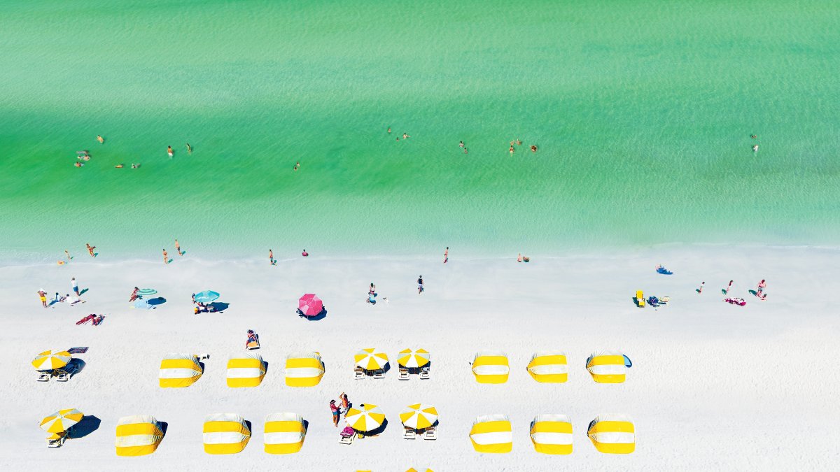 Aerial view of yellow cabanas in Clearwater Beach.