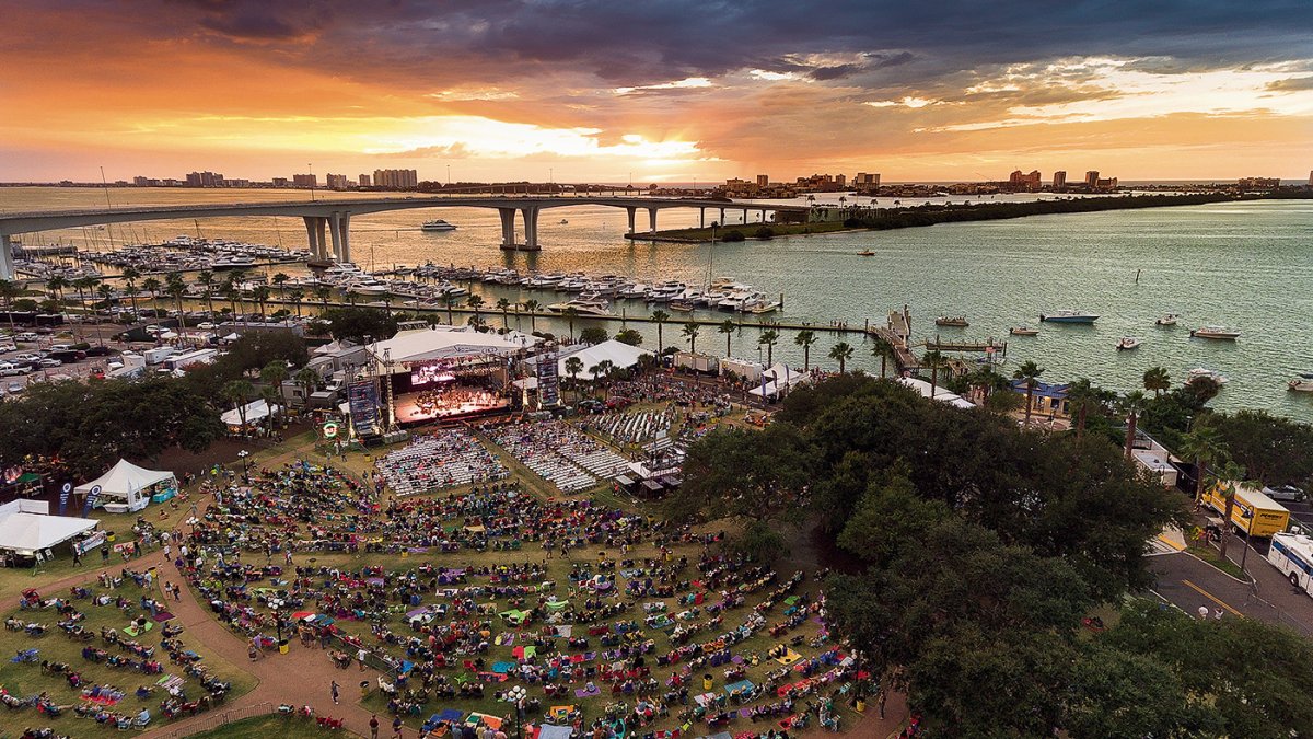 A drone shot of Coachman Park in downtown Clearwater during the Clearwater Jazz Festival at sunset