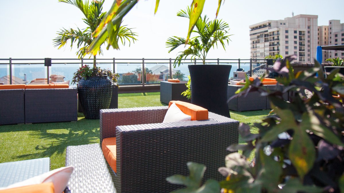 A shot of seating at Hotel Zamora Rooftop Lounge