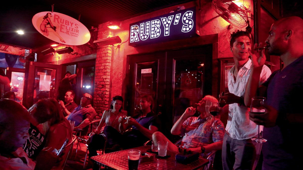 A crowd of patrons outside of Ruby's Elixir Bar in downtown St. Pete