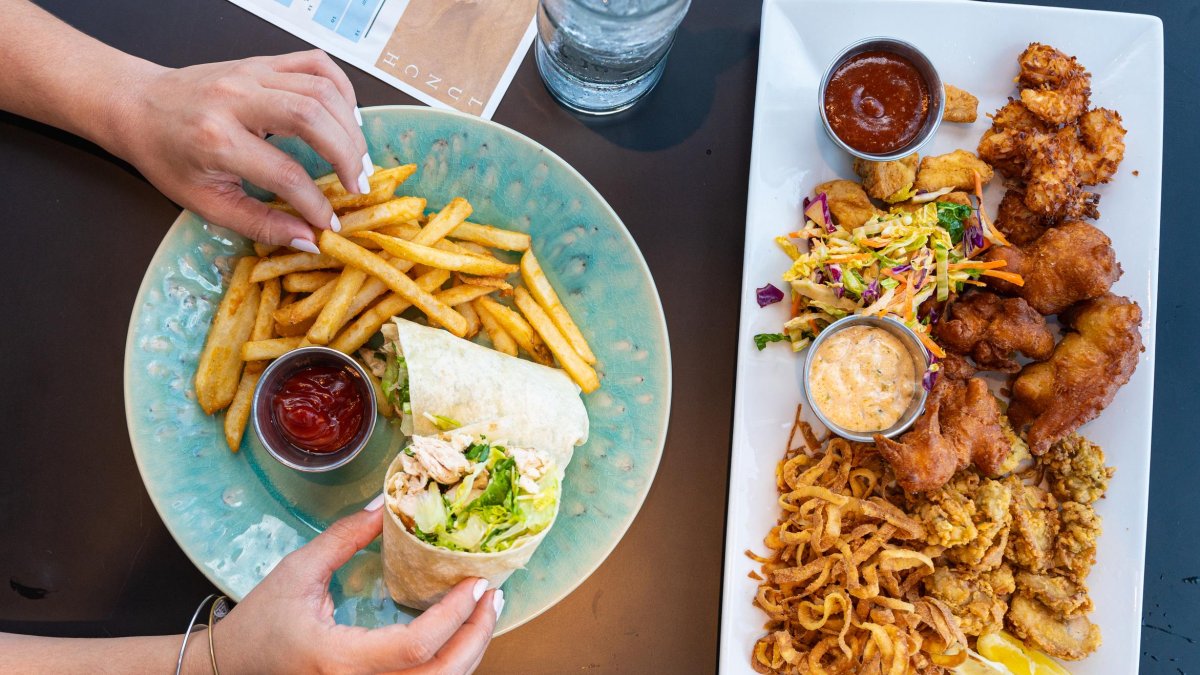 Two plates of foot at Teak on the St. Pete Pier