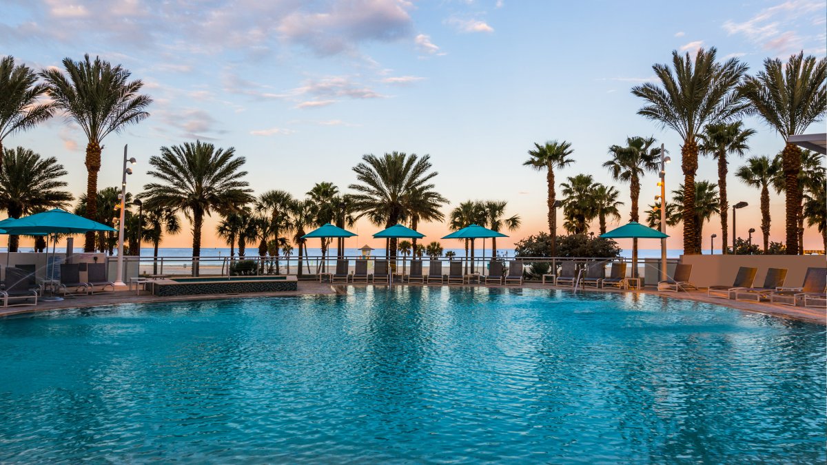 Wyndham Grand Clearwater Beach pool during sunset