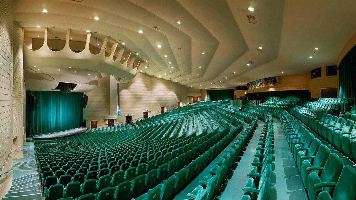 Ruth Eckerd Hall's green chairs and stage.