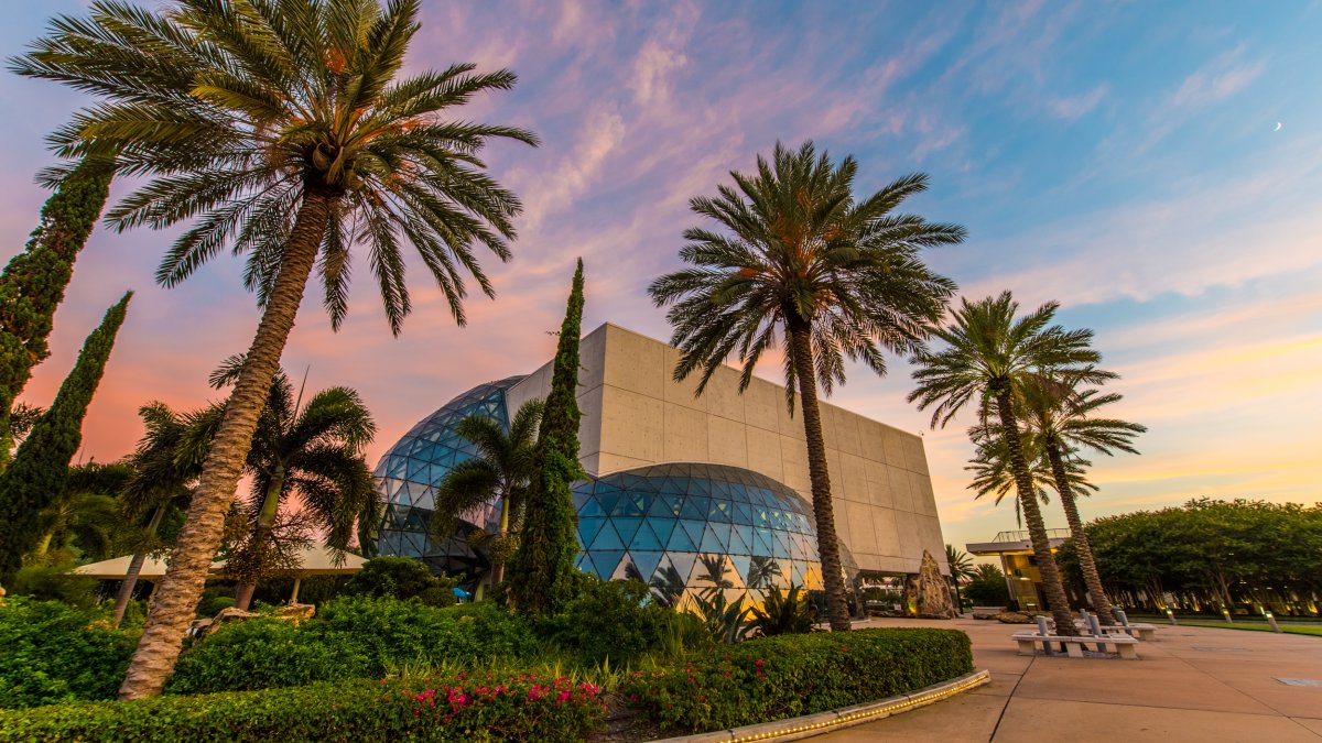 A view of the unique architecture of the Dali Museum at sunset.