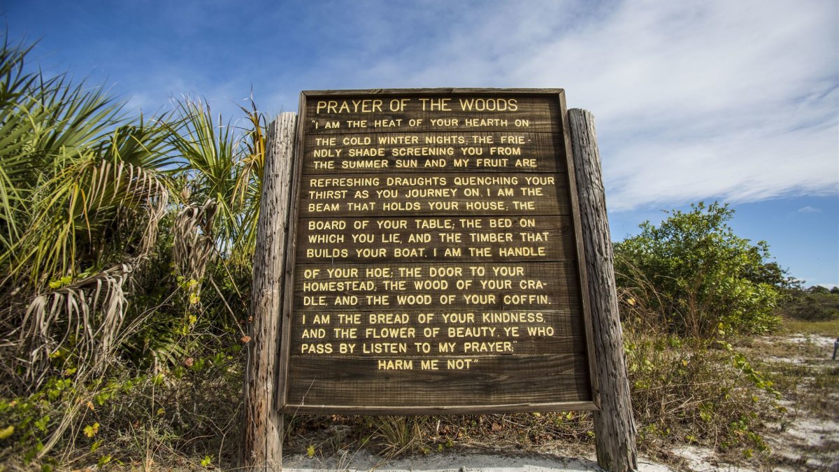 A image of the Prayer of the Woods sign at Weedon Island