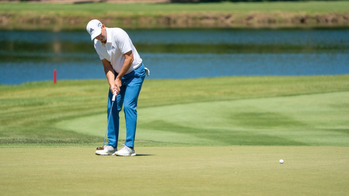 An older man playing golf.