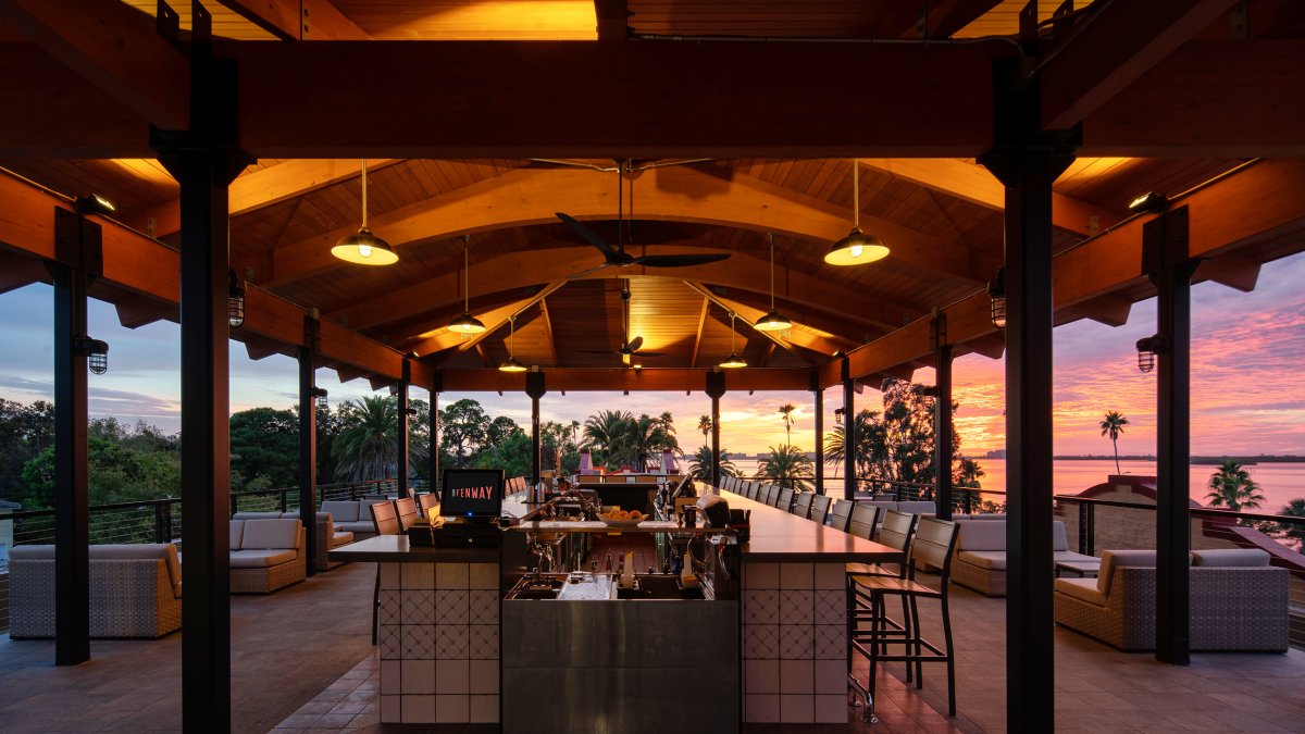 A wide angle shot of the Hi-Fi Rooftop Bay at the Fenway Hotel at Sunset