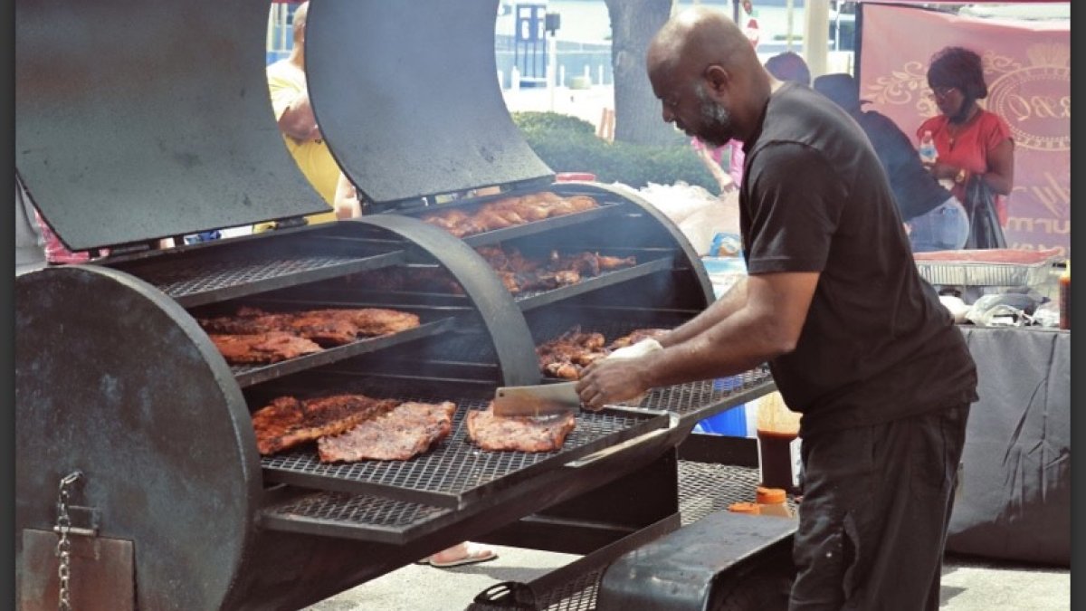 Saturday Morning Shoppe vendor cooking bbq