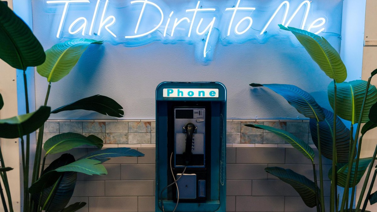 Image of the secret payphone entrance at Dirty Laundry in St. Pete to enter their special speakeasy lounge.