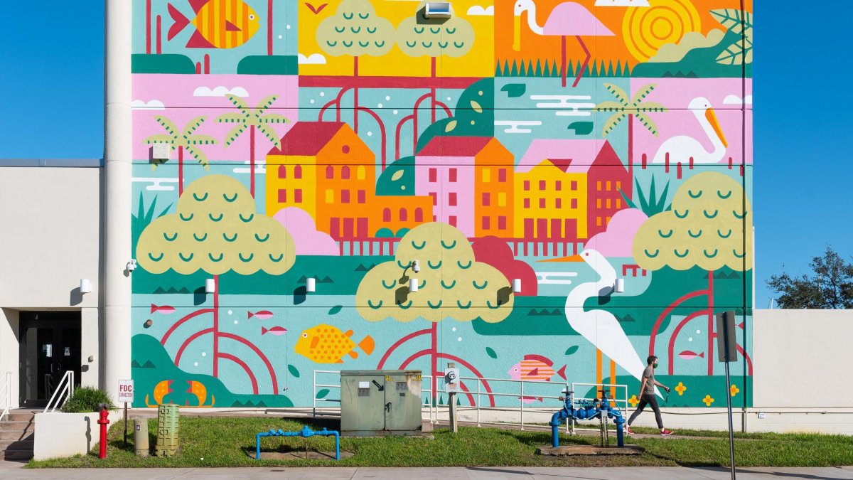 A brightly colored folk art style mural depicting mangroves, bird life and the environment near St. Pete FL), Museum Waterfront District