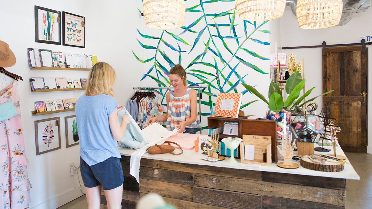 A woman shopping at a boutique