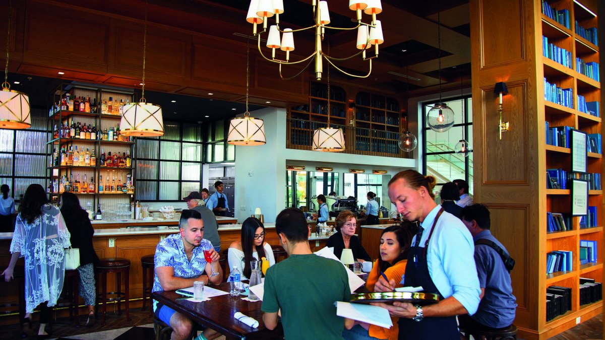 Group of guests ordering food at The Library restaurant in St. Pete