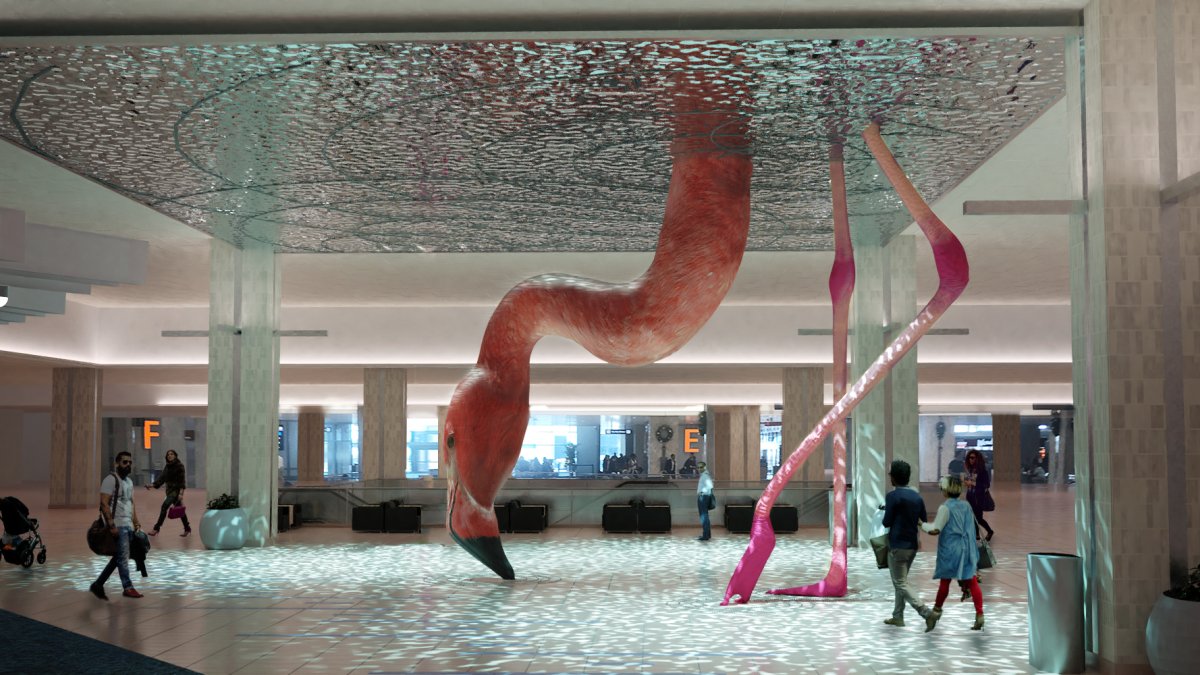 a 21 foot tall pink flamingo sculpture by Matthew Mazzotta at Tampa International Airport