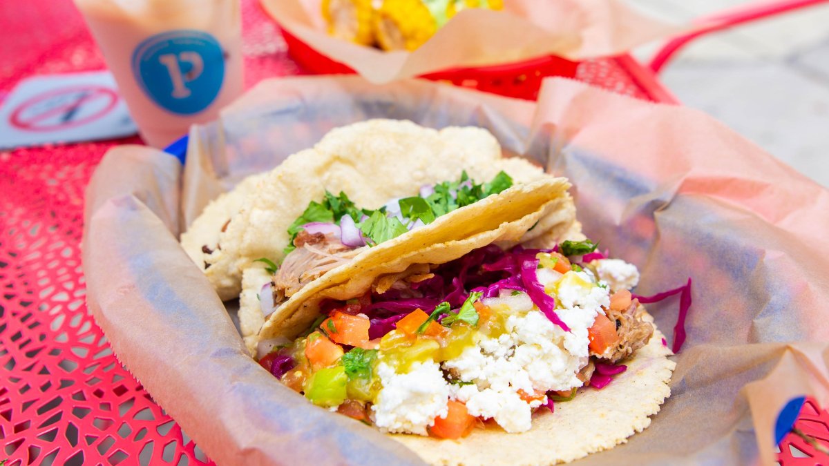 Pink basket of delicious tacos from Poppo's Taqueria Mexican restaurant in St. Pete.