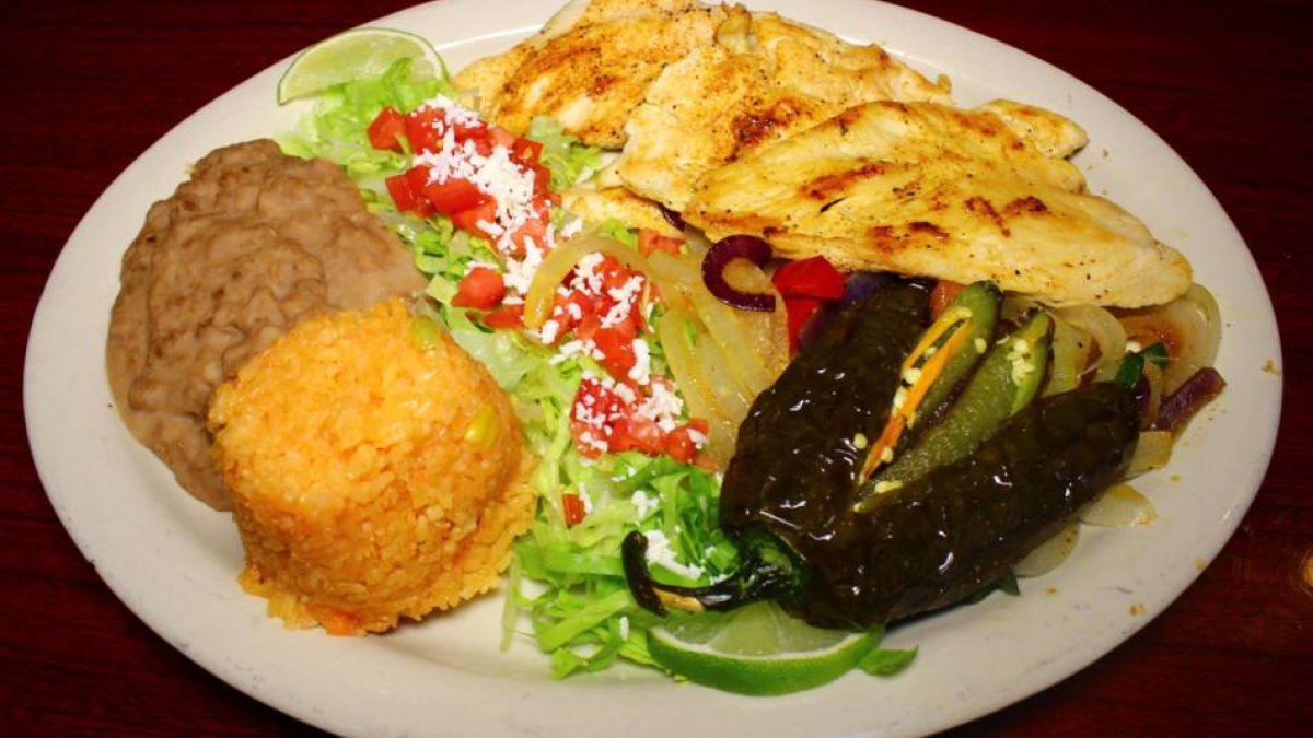 Plate of Mexican cuisine at Los Amigos Dos restaurant in Dunedin, FL