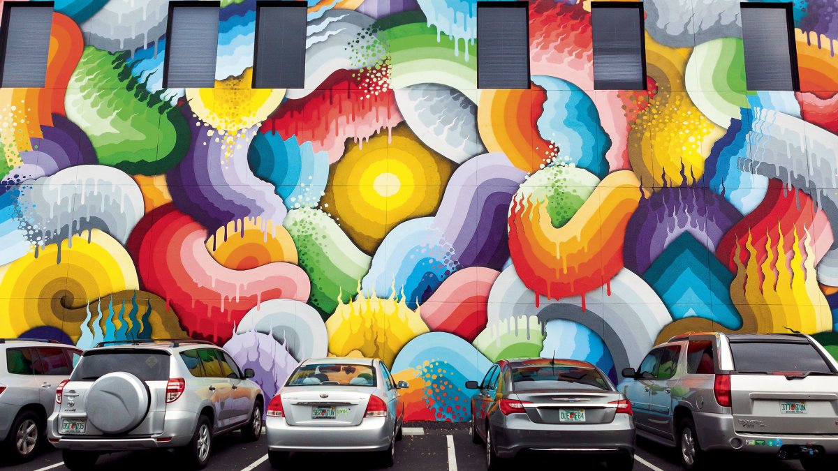 a swirling, incredibly vibrant mural depicting the "Eye of the Storm" by Ricky Watts in St. Pete's Central Arts District